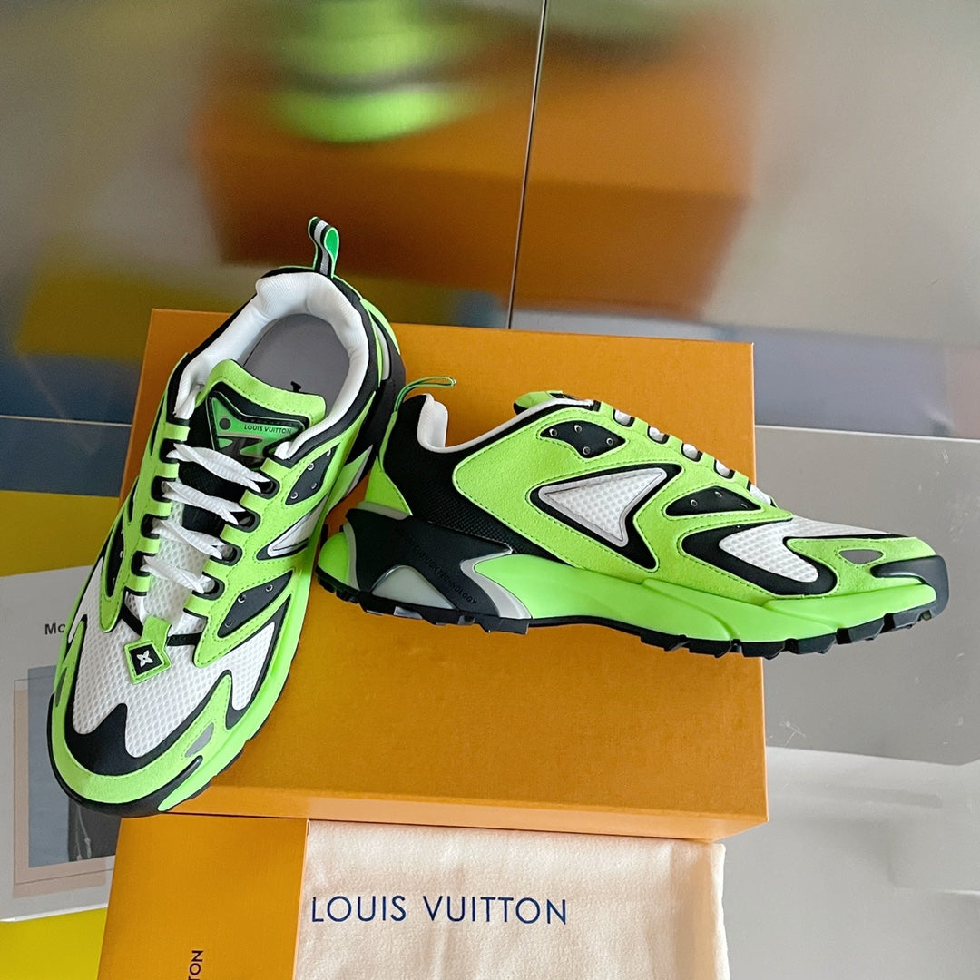 Louis Vuitton sneakers with neon green uppers, white paneling, and chunky black outsole