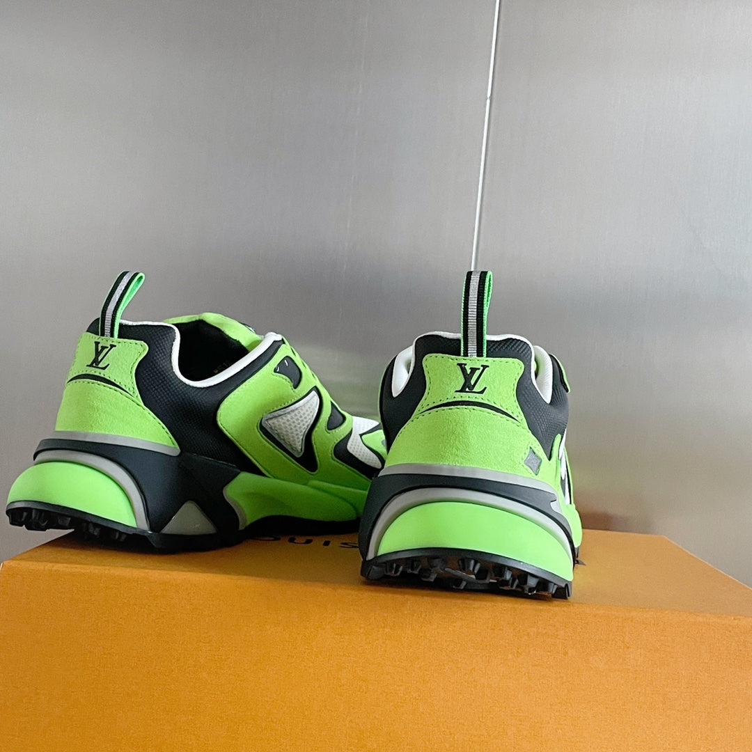 Louis Vuitton sneakers heel view in neon green and black with white accents and treaded soles