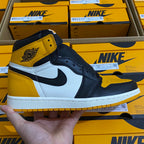 High-top sneakers with yellow, white, and dark blue panels and black swoosh