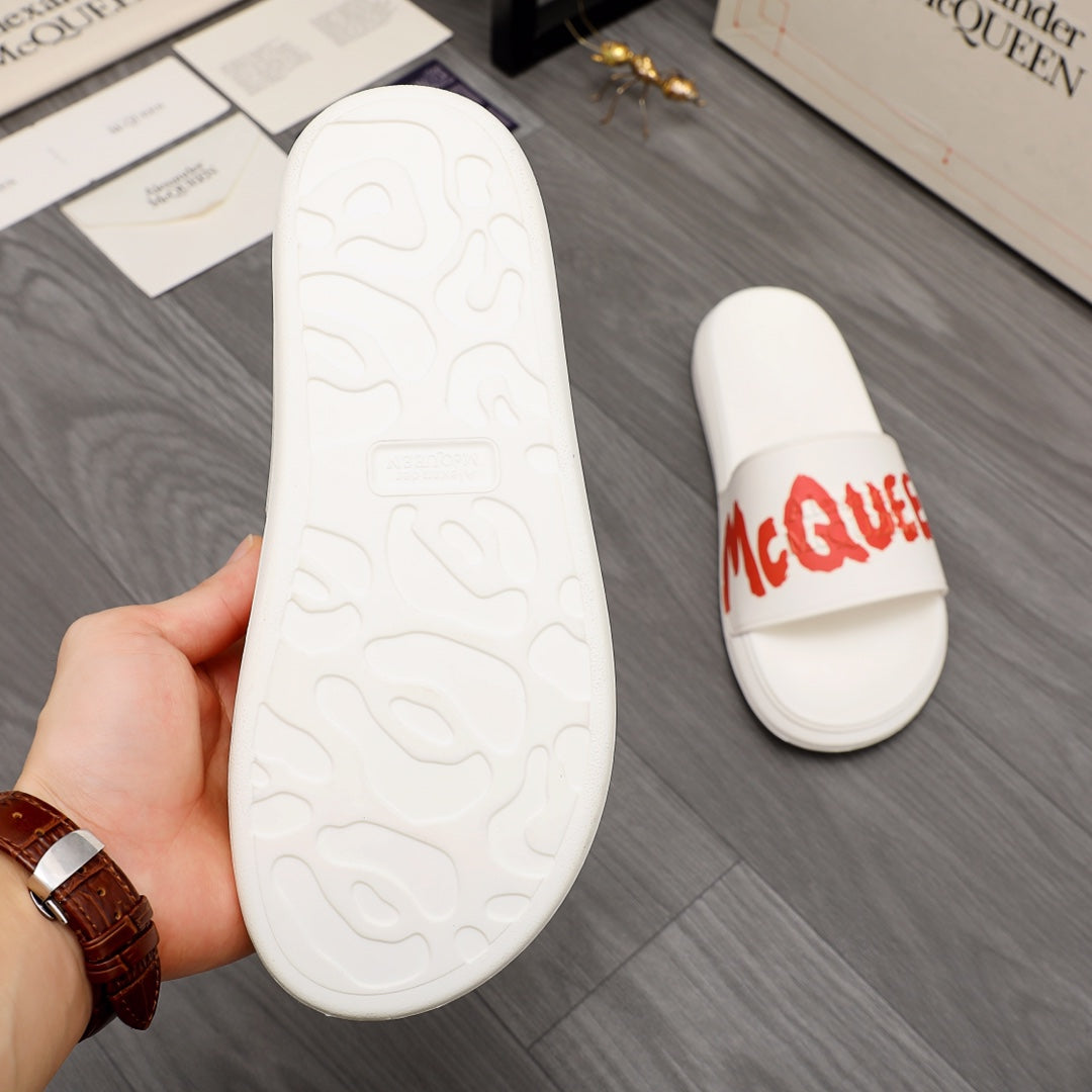 White slide sandal outsole with textured tread, plus red logo strap