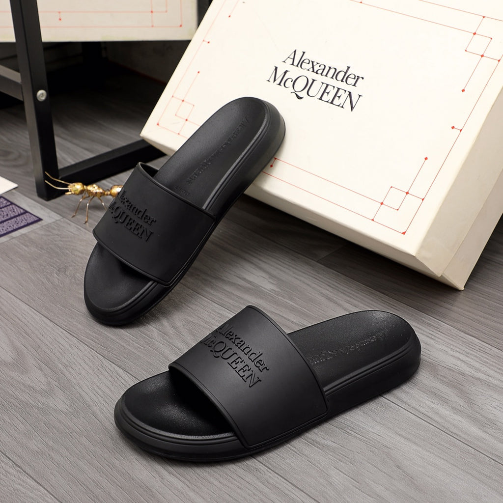 Black slide sandals with wide strap and Alexander McQUEEN logo, open toe
