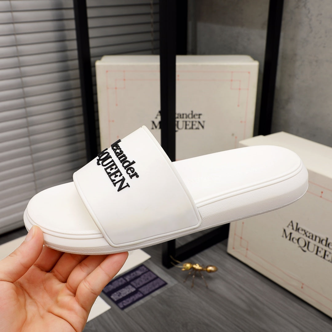 White slide sandal with wide strap and Alexander McQUEEN logo