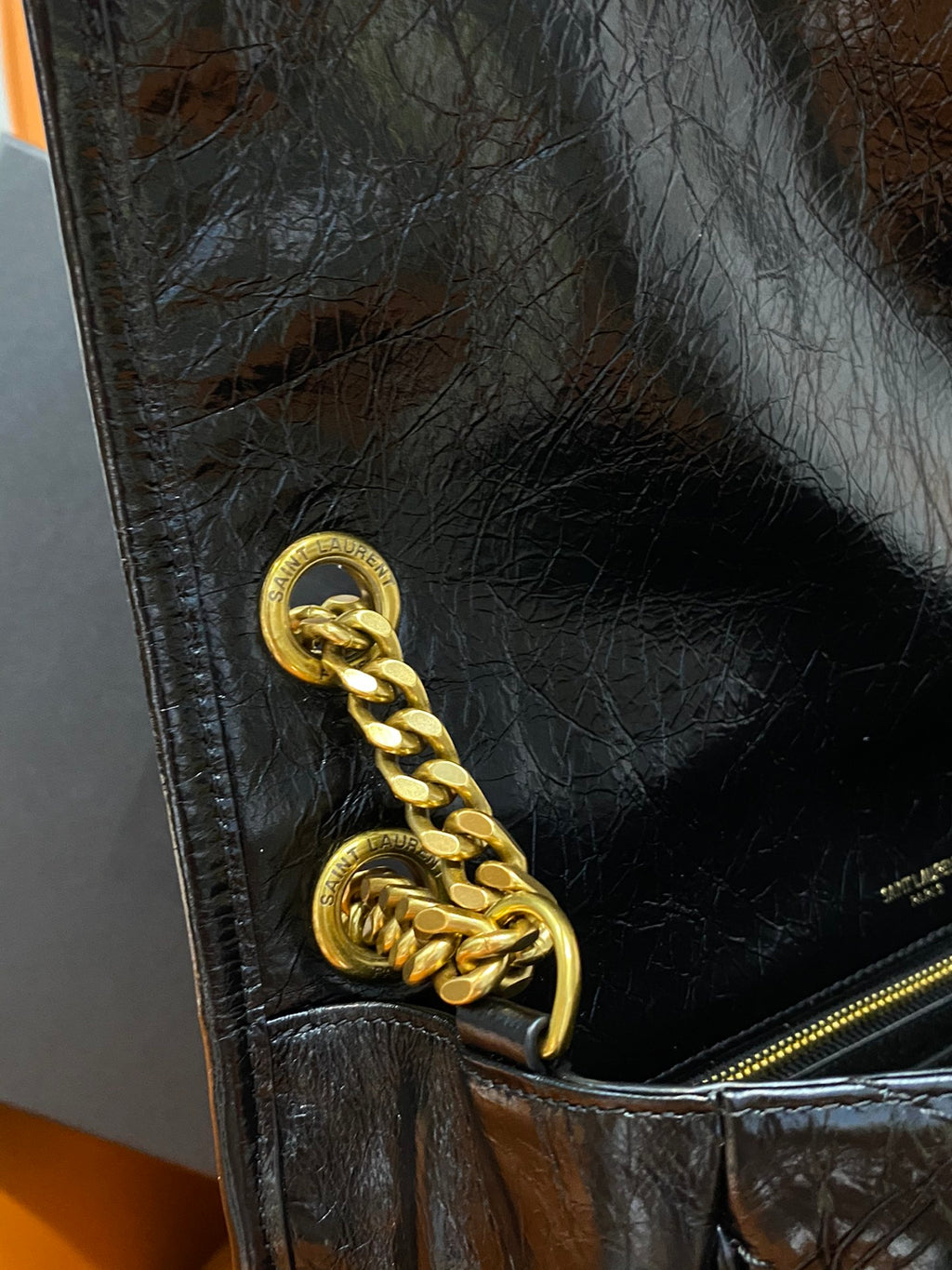 YSL Saint Laurent bag corner, dark blue leather with gold chain and zipper pull