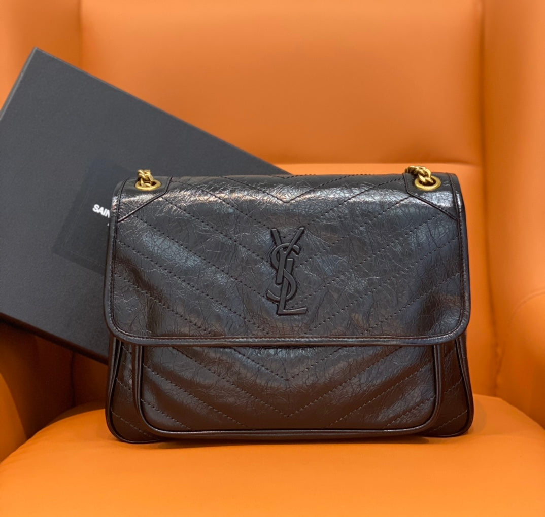 YSL Saint Laurent shoulder bag, dark blue quilted leather with gold logo and clasp