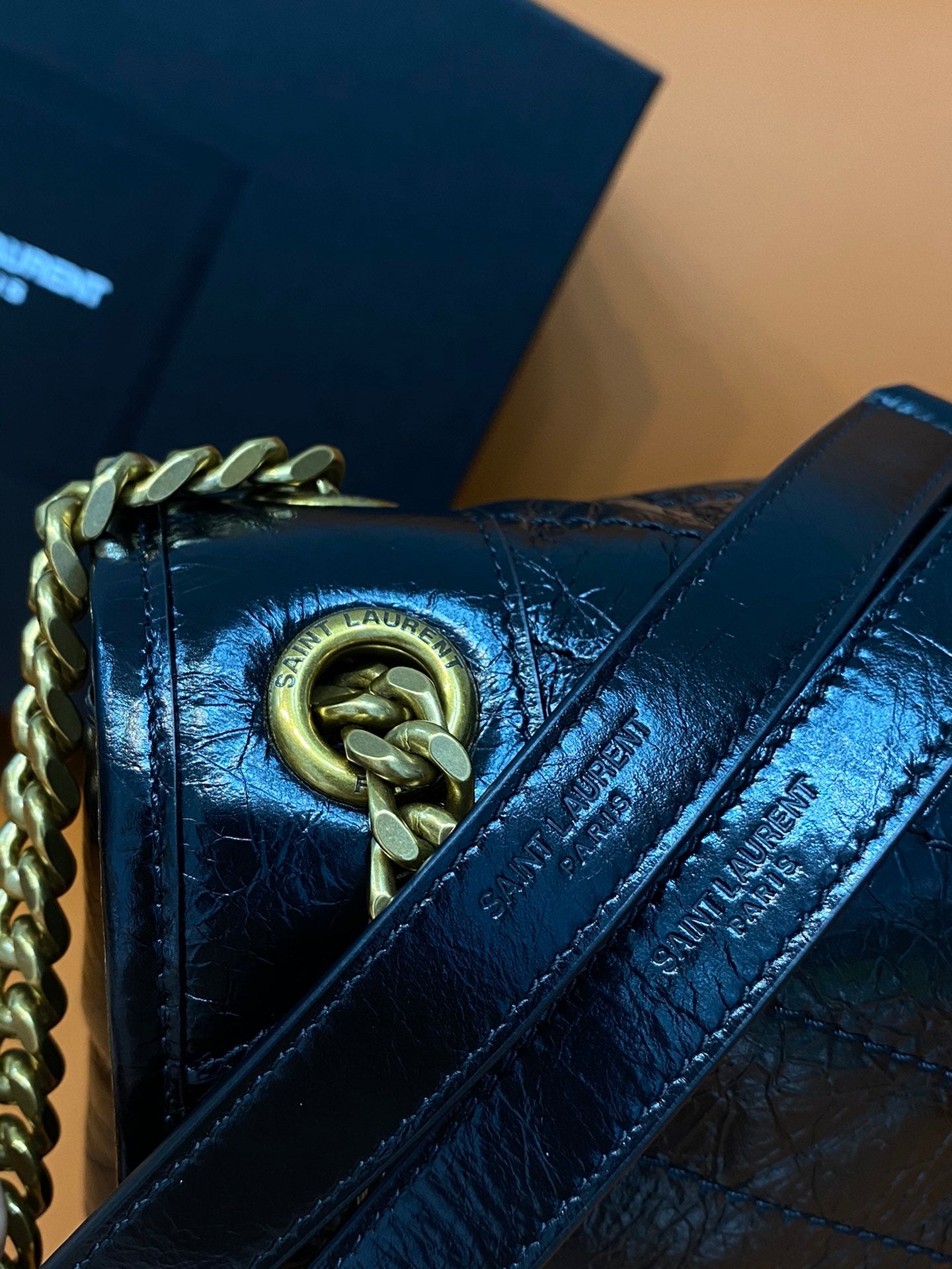 YSL Saint Laurent shoulder bag hardware, dark blue leather with gold chain and clasp