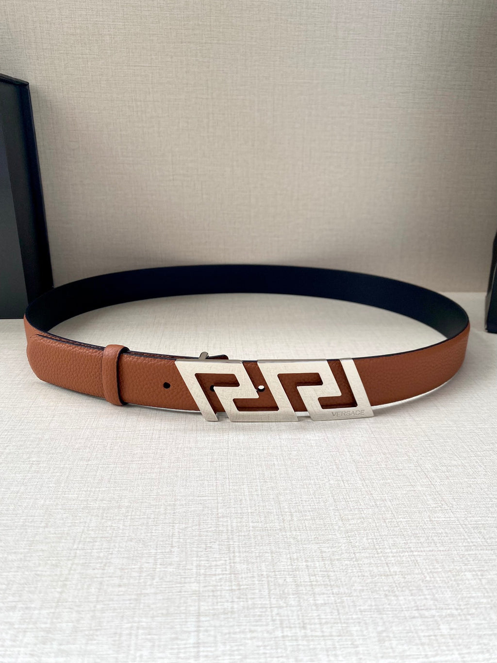 Versace belt with tan leather strap and gold logo buckle
