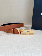Versace belt with tan leather strap and gold Greek-key buckle