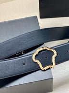 Dark blue leather belt with gold-tone Medusa-shaped buckle detail