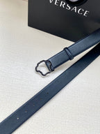Navy leather belt strap with silver-tone buckle frame and punched holes