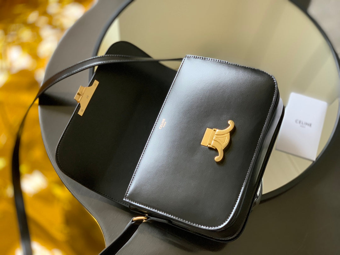 Celine small leather crossbody bag with flap, gold hardware, and horse logo