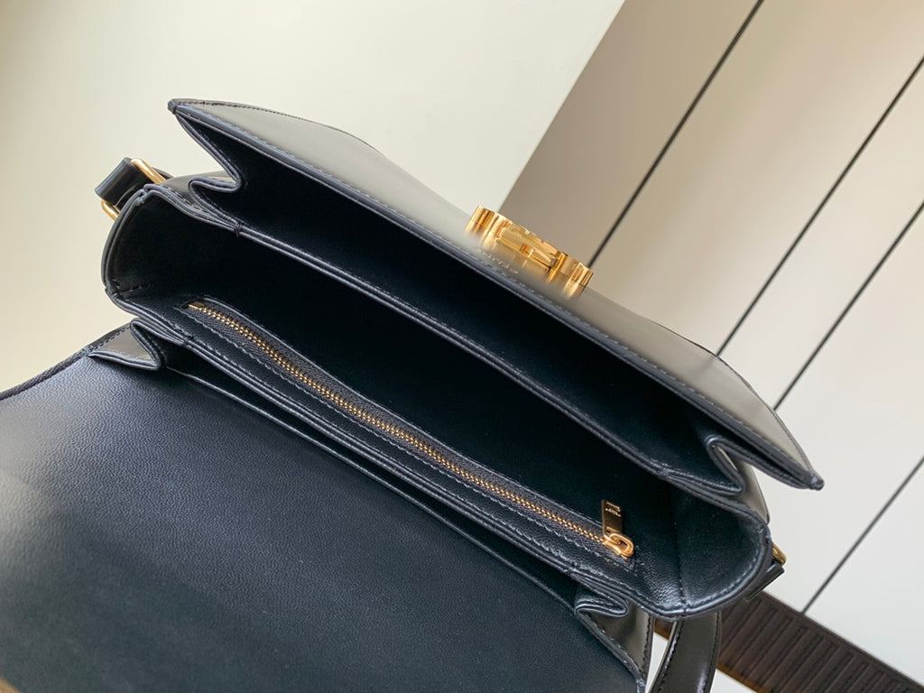 Celine leather crossbody bag open view with zipper pocket and gold trim