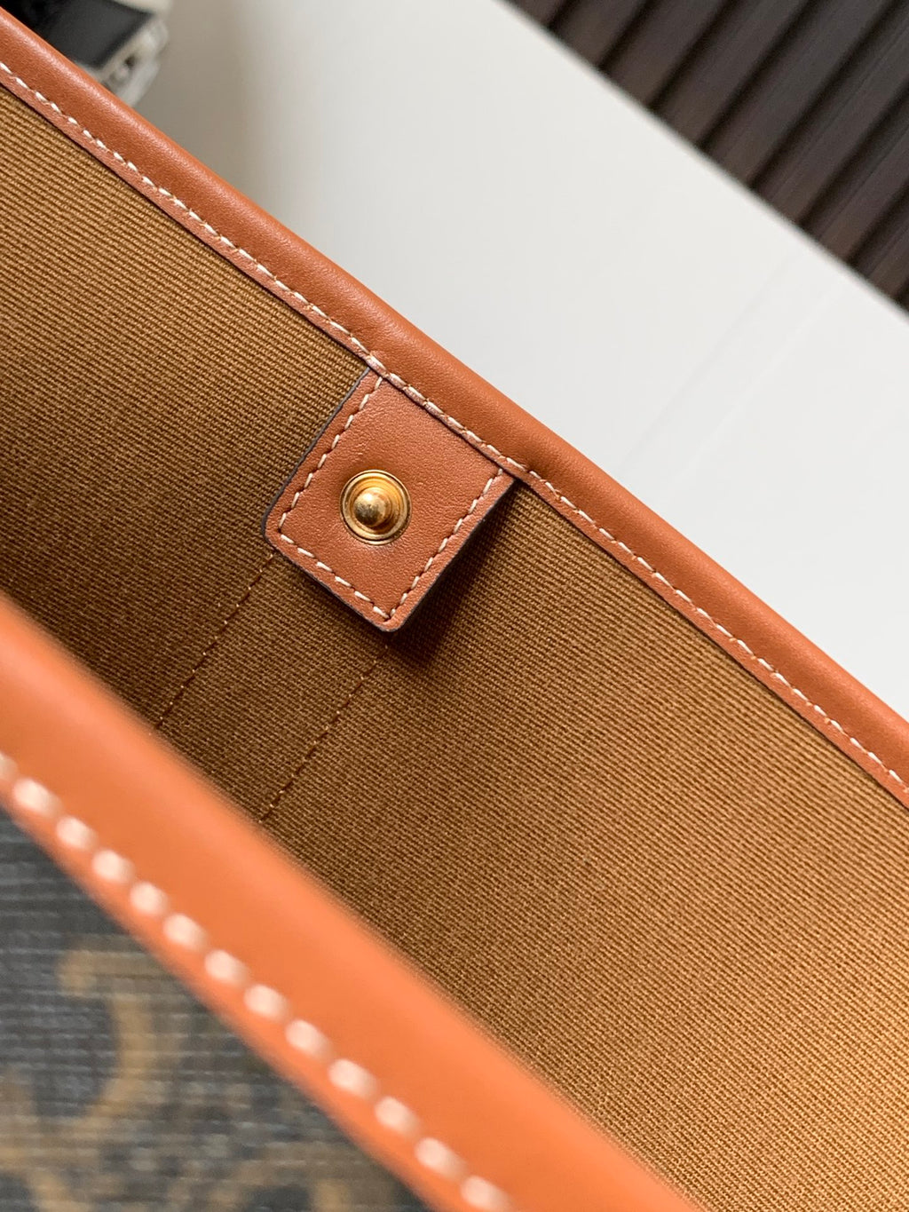 Celine bag canvas side with tan leather snap pocket and stitched trim