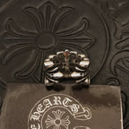 Chunky silver-tone ring with ornate floral centerpiece and raised petals.