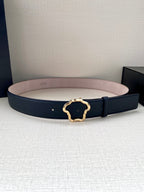 Navy leather belt with gold-tone logo buckle and light pink lining