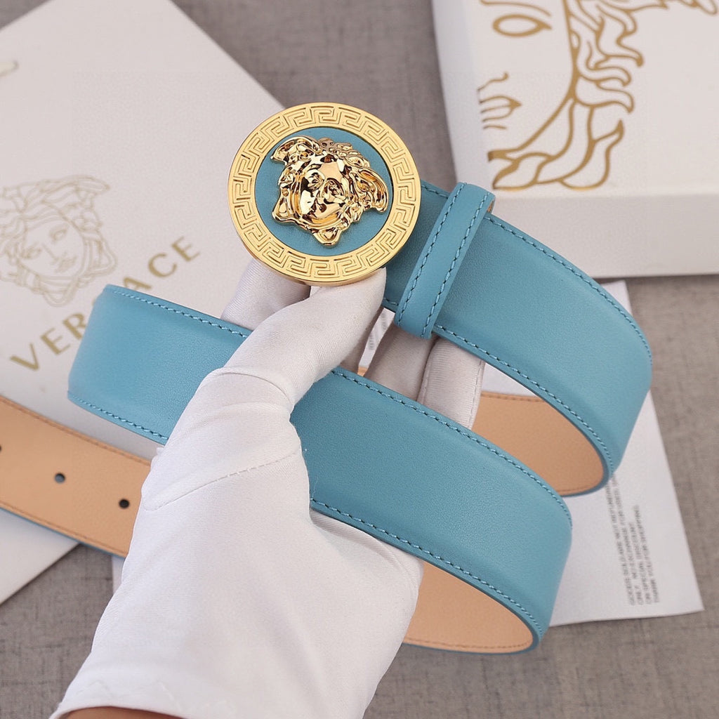 Sky blue belt with gold Medusa style round buckle and stitched center panel