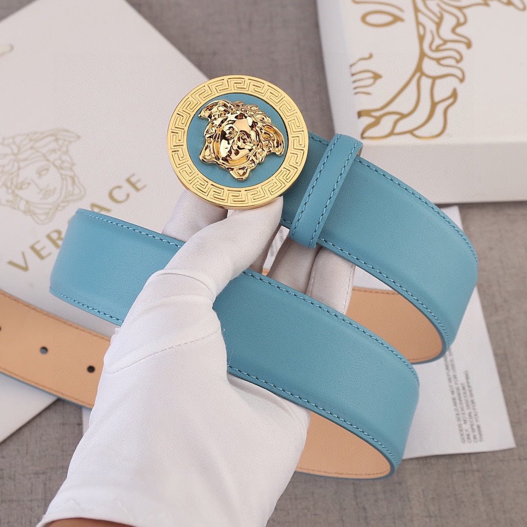 Sky blue belt with gold Medusa style round buckle and stitched center panel