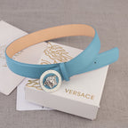 Sky blue leather belt with round silver Medusa style buckle and adjustable strap