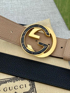 Gucci dark blue leather belt with gold-tone round logo buckle