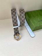 Gucci belt: beige-brown GG canvas strap with white edges and round interlocking G buckle