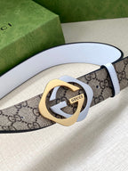 Gucci belt with blue-gray interlocking G buckle on beige-brown GG canvas strap with white lining