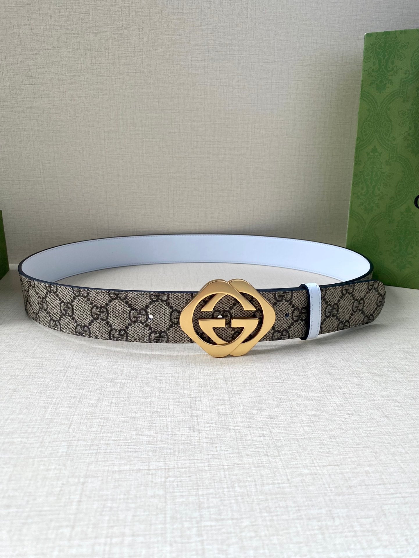 Gucci belt with GG monogram canvas and white leather edge, gold interlocking buckle