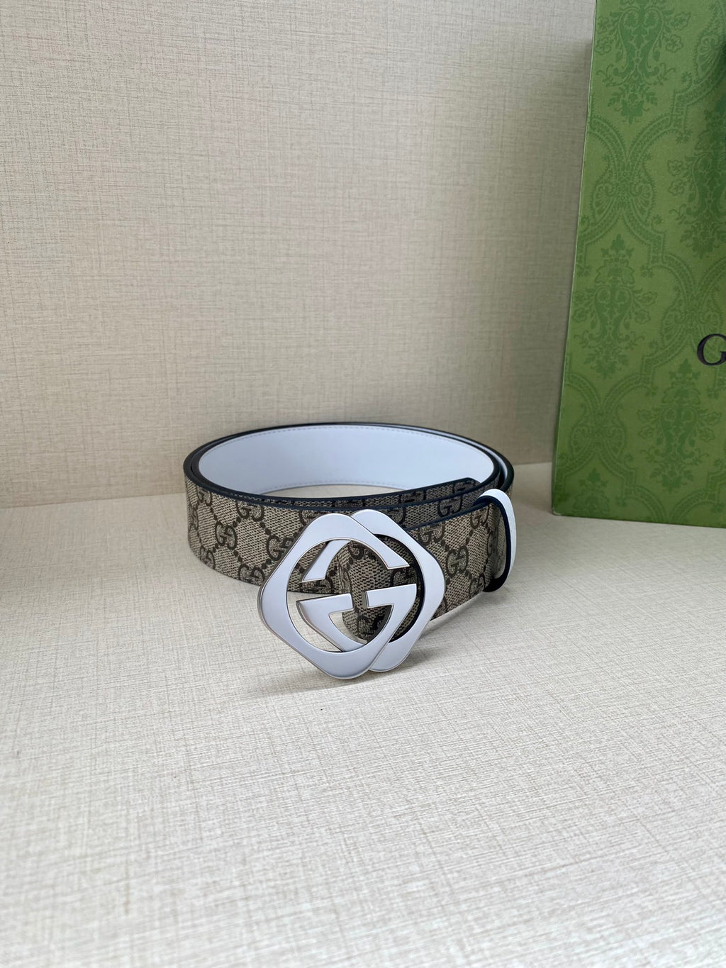 Gucci belt with GG monogram canvas and black side, large silver buckle