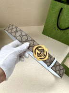 Gucci belt with GG monogram canvas strap, gold-tone Interlocking G buckle, white keeper