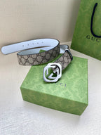 Gucci belt with GG monogram canvas, silver-tone Interlocking G buckle, white strap with holes