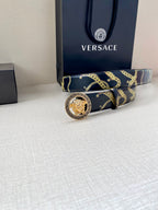 Navy belt with gold chain pattern and circular buckle with gold center