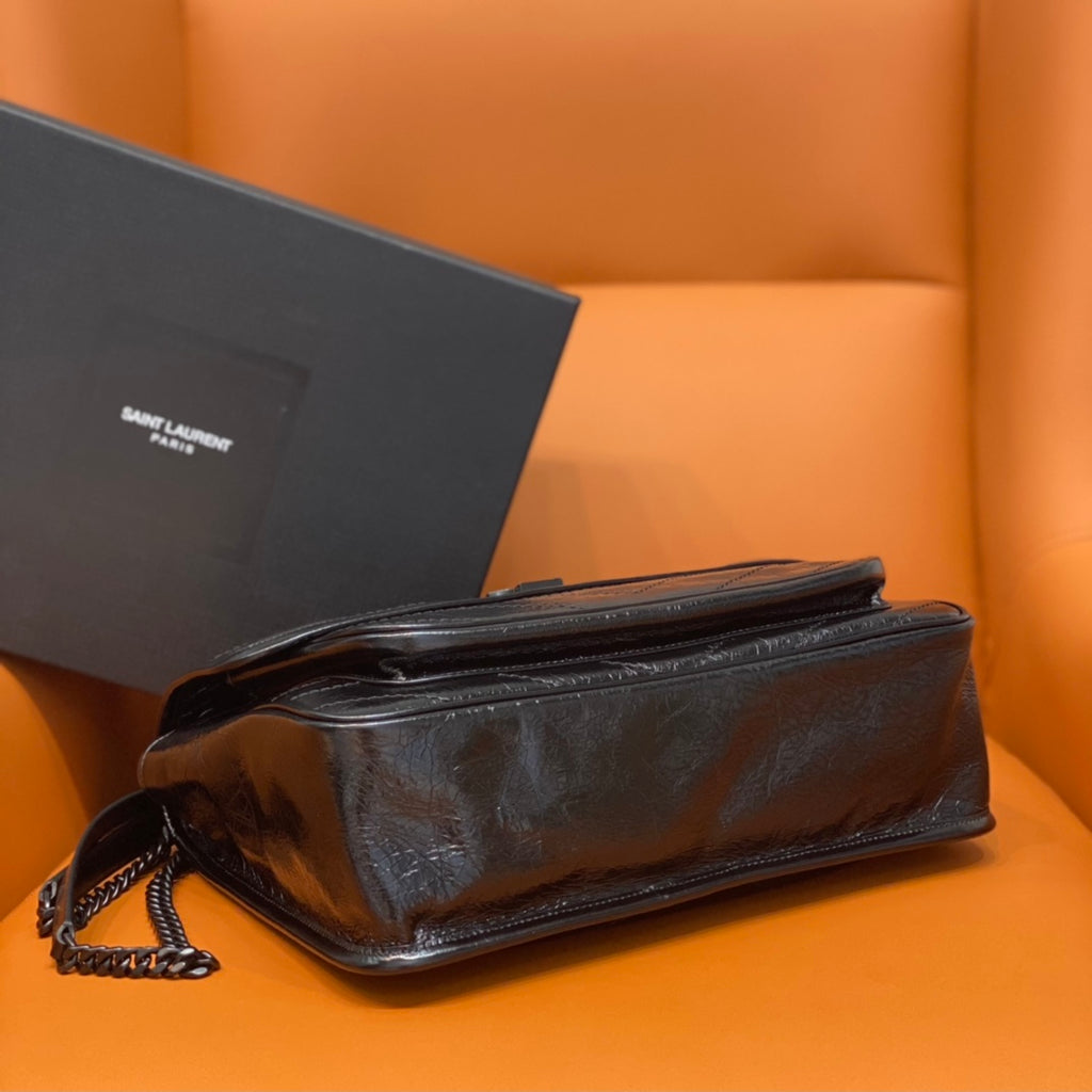 YSL Saint Laurent bag with chain strap and textured leather finish
