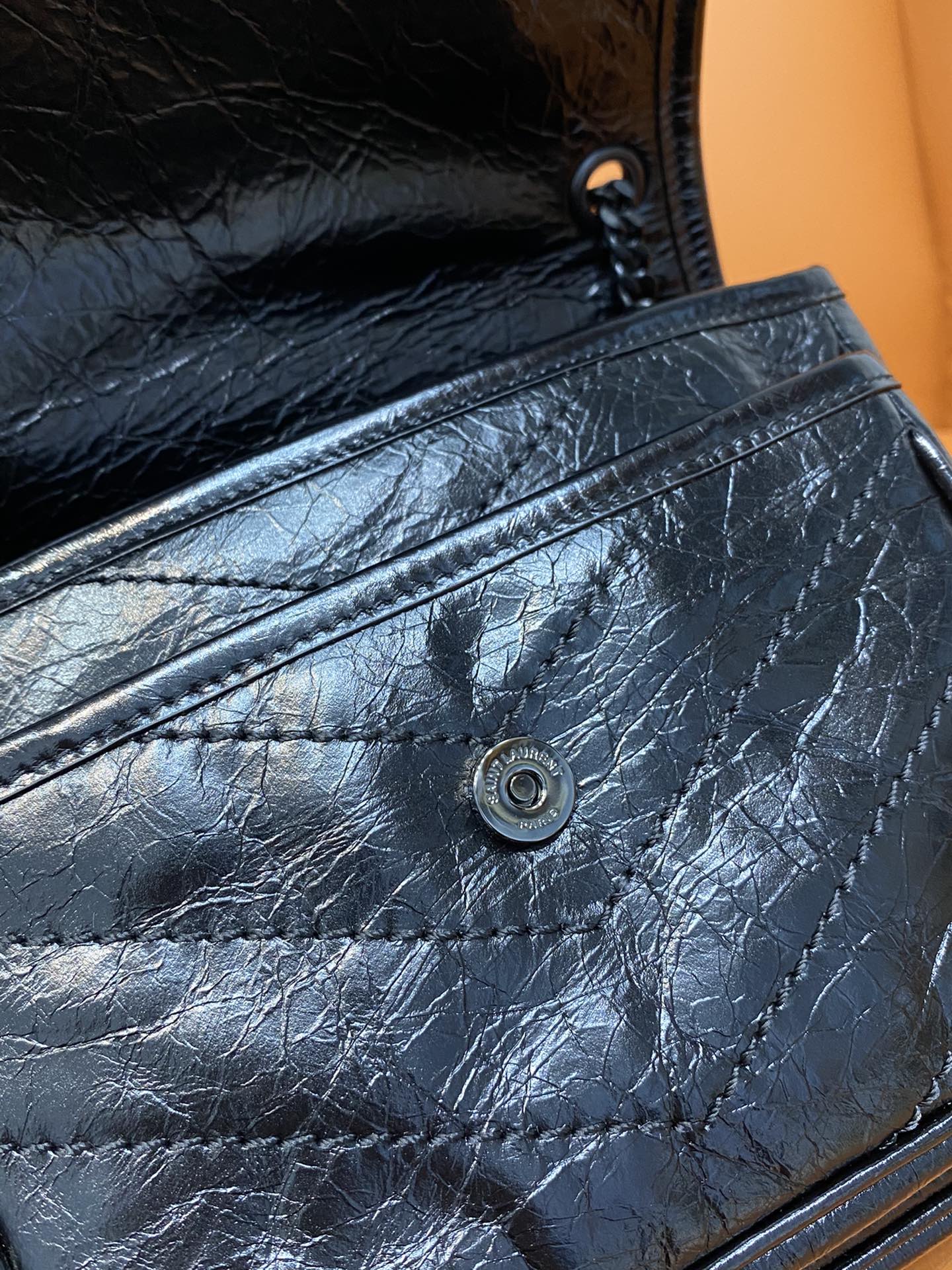 Saint Laurent blue quilted leather bag with snap closure and front flap seam