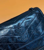 Saint Laurent YSL monogram on blue quilted leather bag front flap
