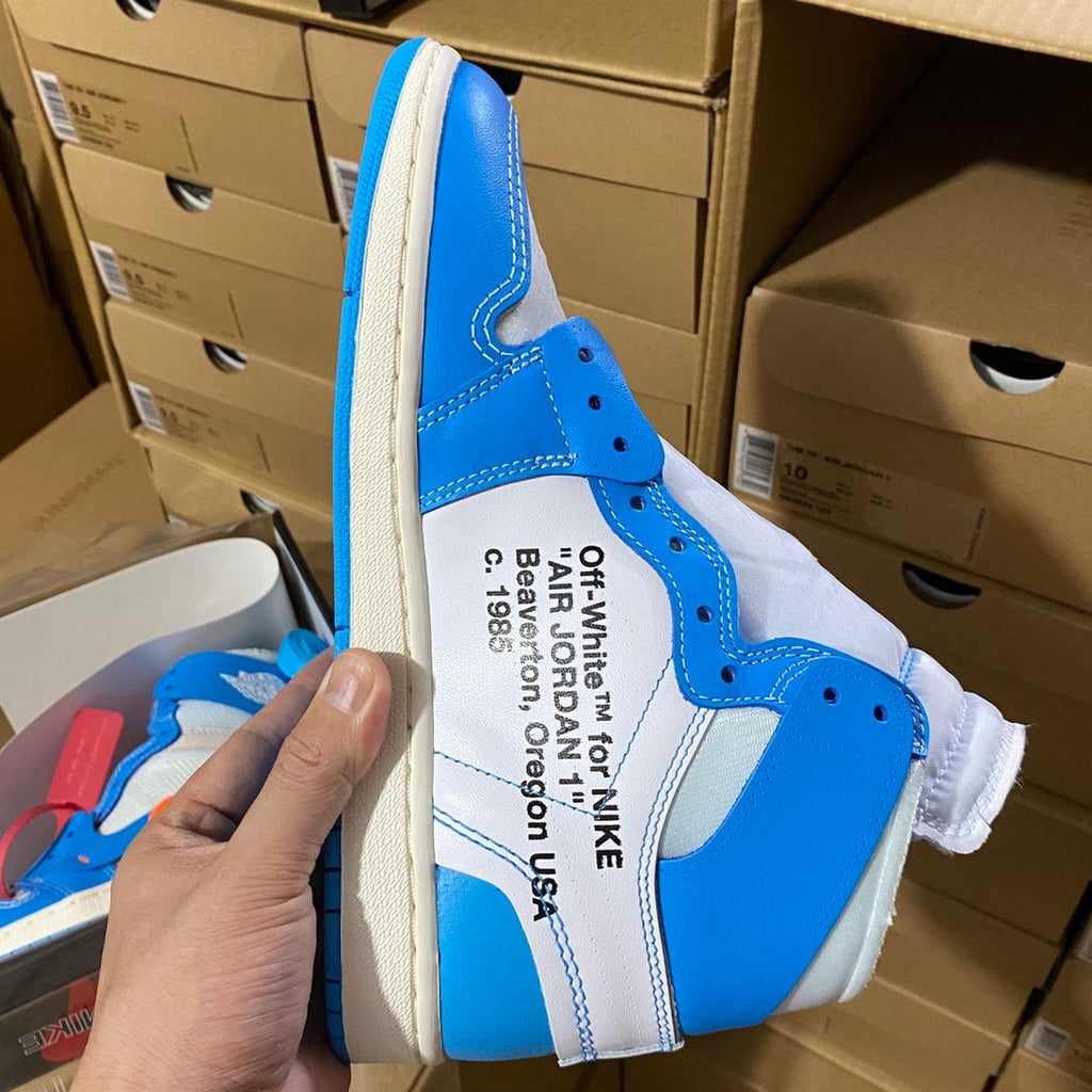 Blue and white high-top sneaker heel with printed label on the collar.