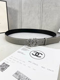 Chanel leather belt with gray strap and engraved logo buckle, includes adjustment holes