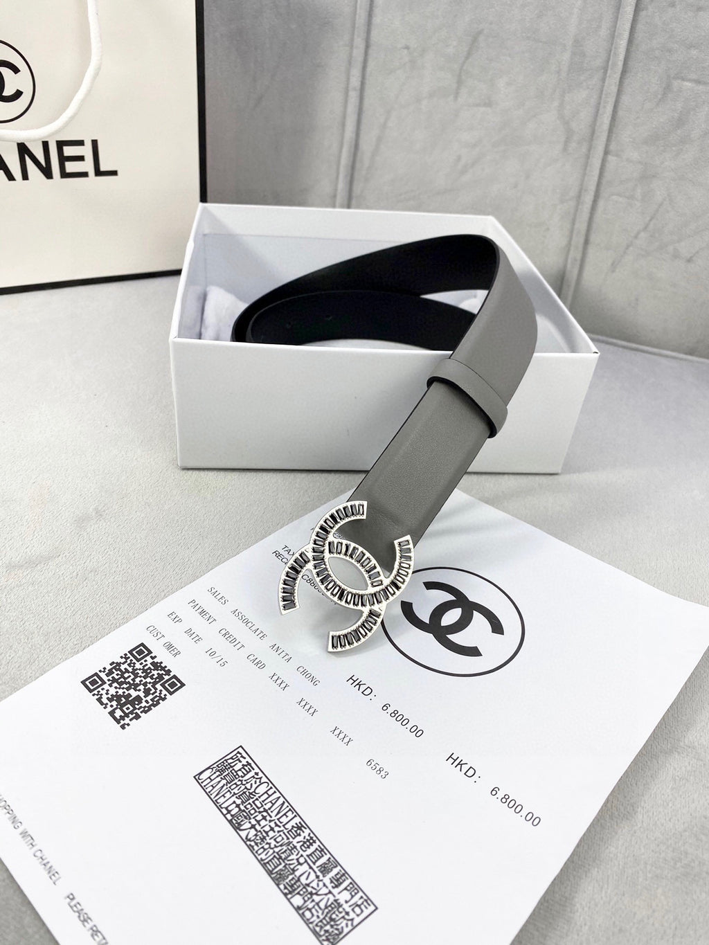 Chanel leather belt in gift box with gray strap and gold-tone CC logo buckle