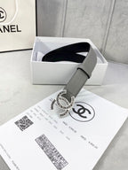 Chanel leather belt in gift box with gray strap and gold-tone CC logo buckle