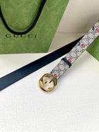 Gucci belt, navy leather strap with GG monogram Mickey print; gold-tone interlocking buckle