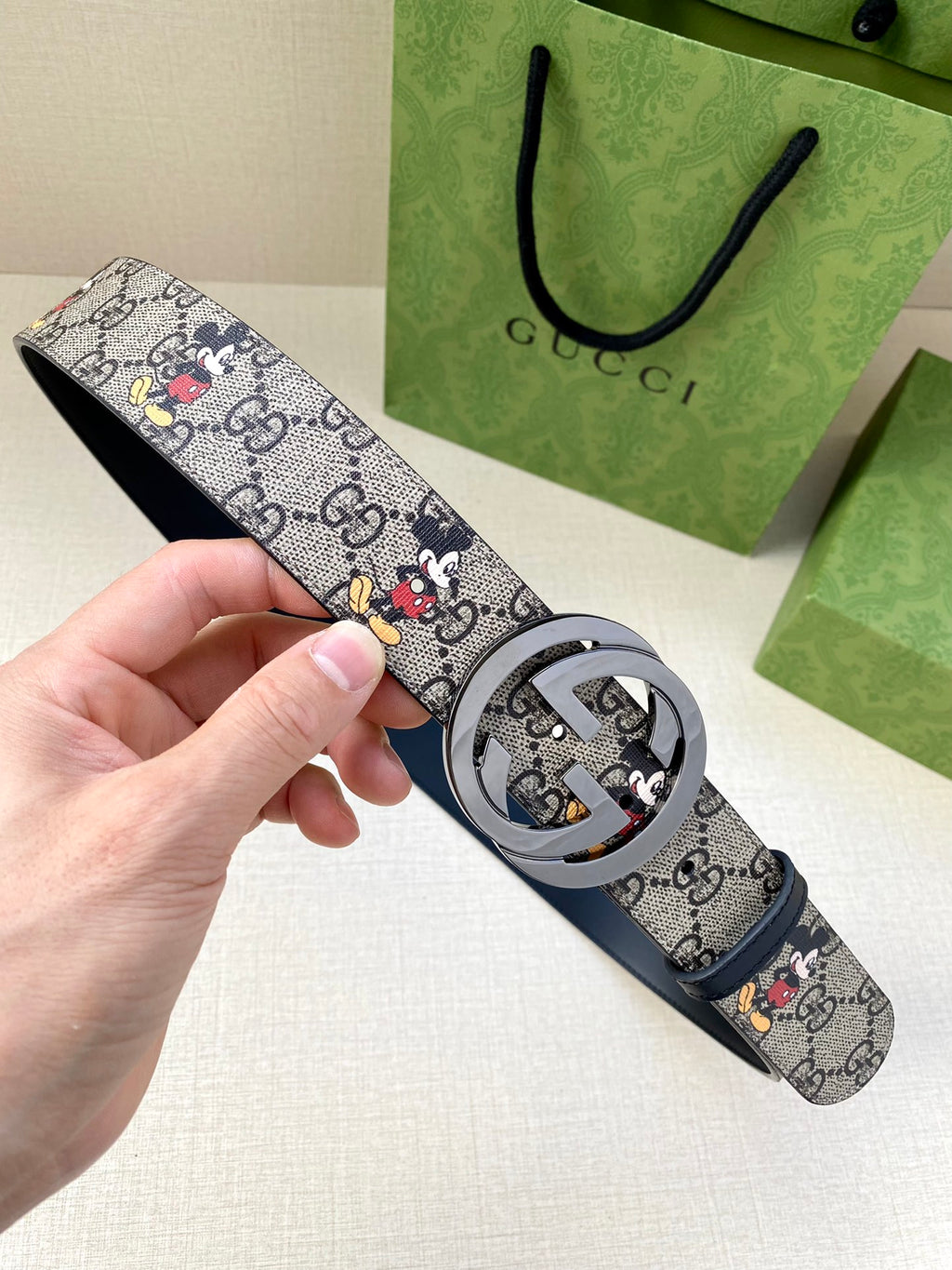 Gucci belt with navy GG monogram Mickey print; silver interlocking G buckle