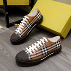Burberry check-print low-top sneakers with white laces and dark rubber sole