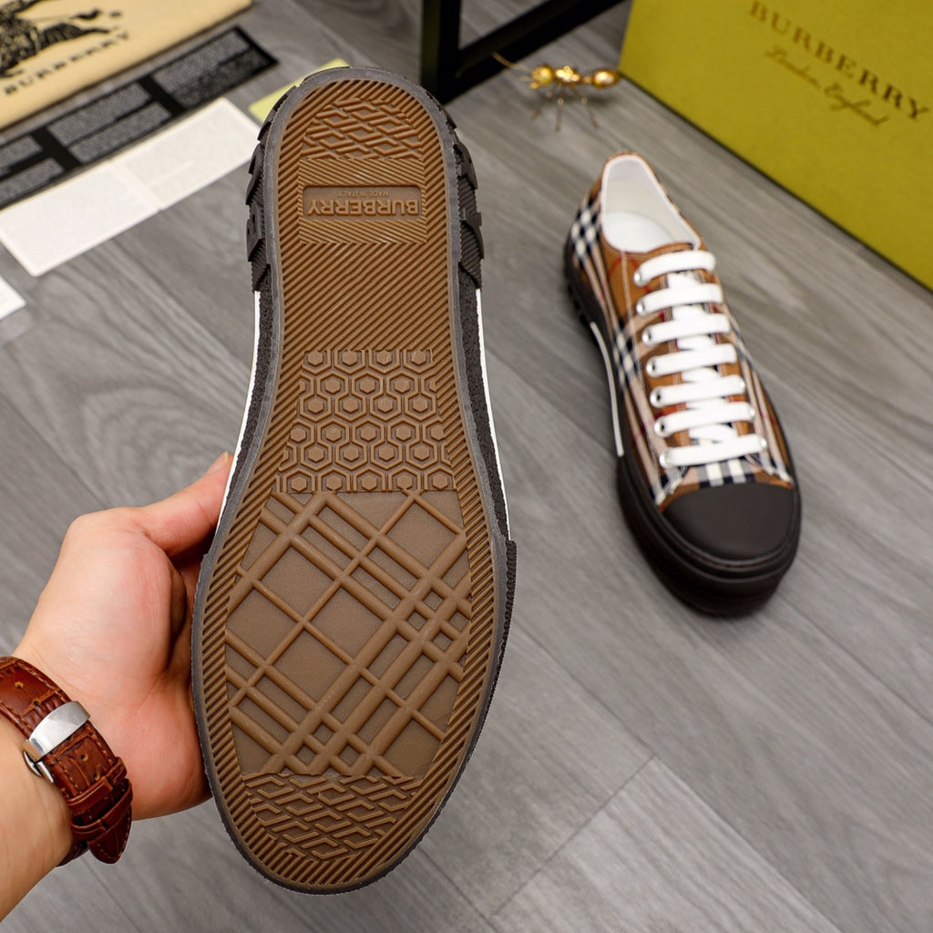Burberry sneaker outsole view with textured tread and check-print upper