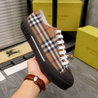 Burberry check-print low-top sneaker with white laces and textured dark sidewall