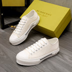 Burberry white low-top sneakers with lace-up front and textured rubber sole