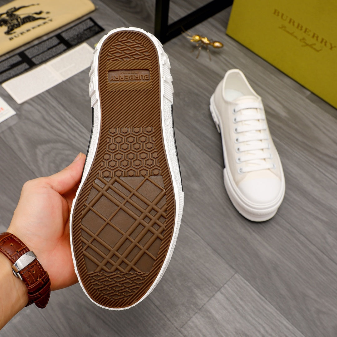 Burberry sneaker outsole with brown tread and white lace-up upper