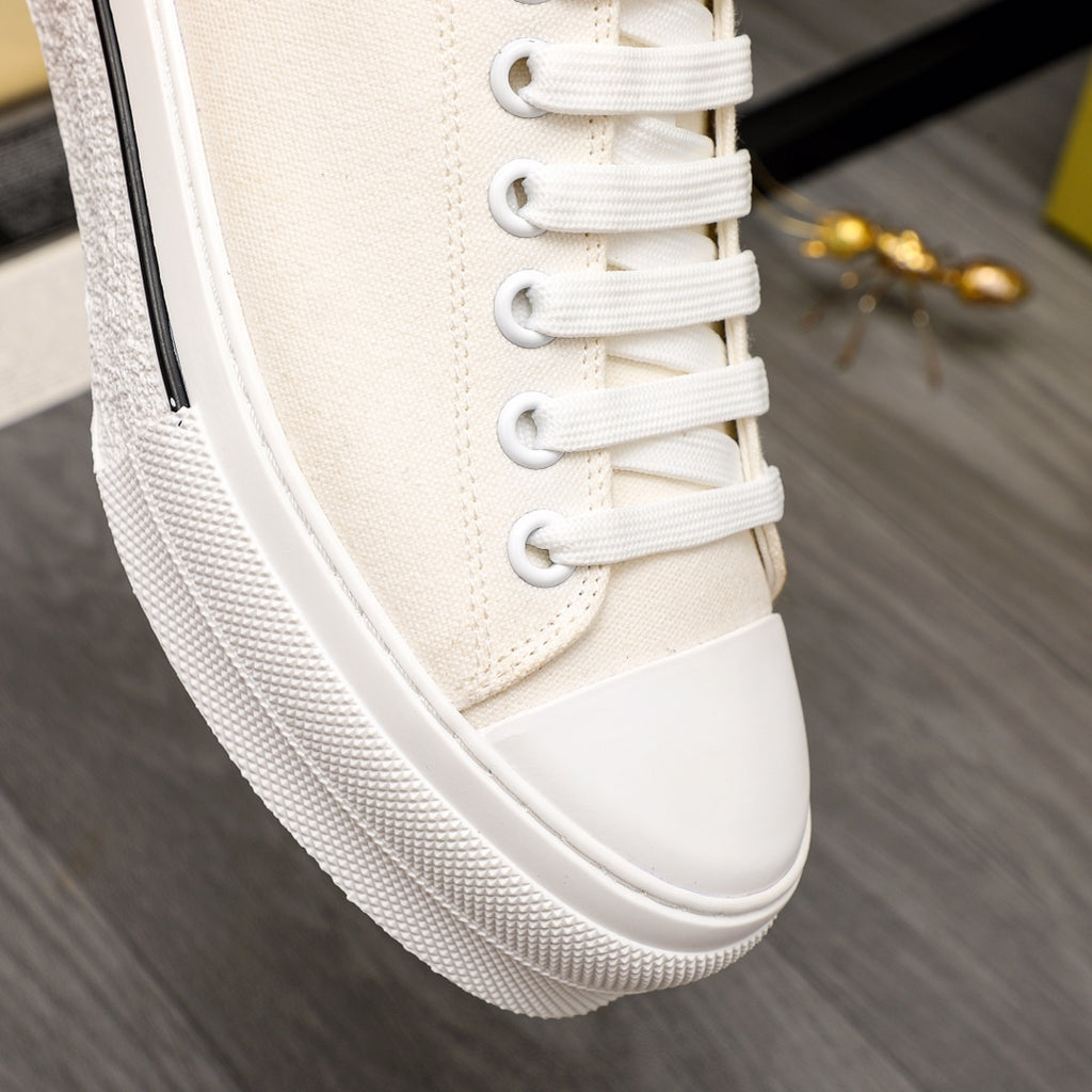 Burberry white sneaker upper close-up with lace eyelets and cupsole edge
