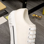 Burberry white sneaker with ankle collar, lace-up laces, and side panel