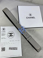 Chanel belt in light gray leather with blue-and-gold logo buckle, strap with holes