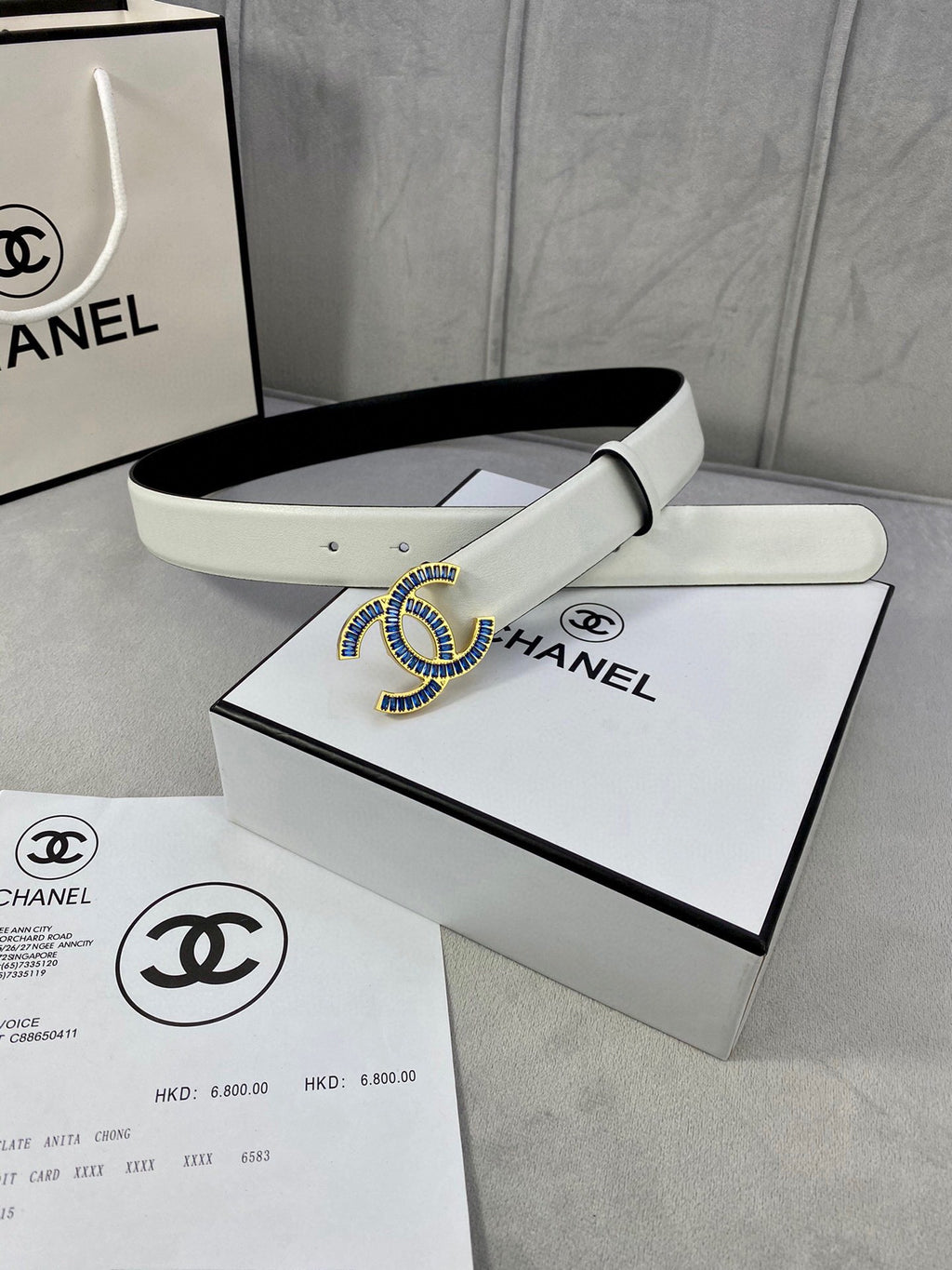 White leather belt with CHANEL logo buckle and ring blue enamel detail