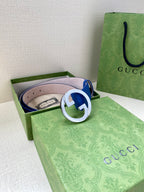 Gucci belt blue with pale pink reverse and silver interlocking GG buckle.