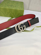 Gucci belt, black logo strap with red edge trim and silver-tone double G buckle