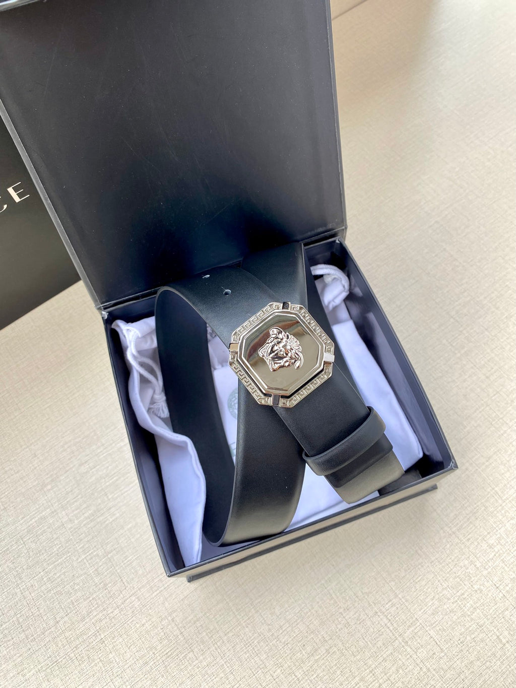 Versace leather belt in box, dark blue strap with silver-toned buckle
